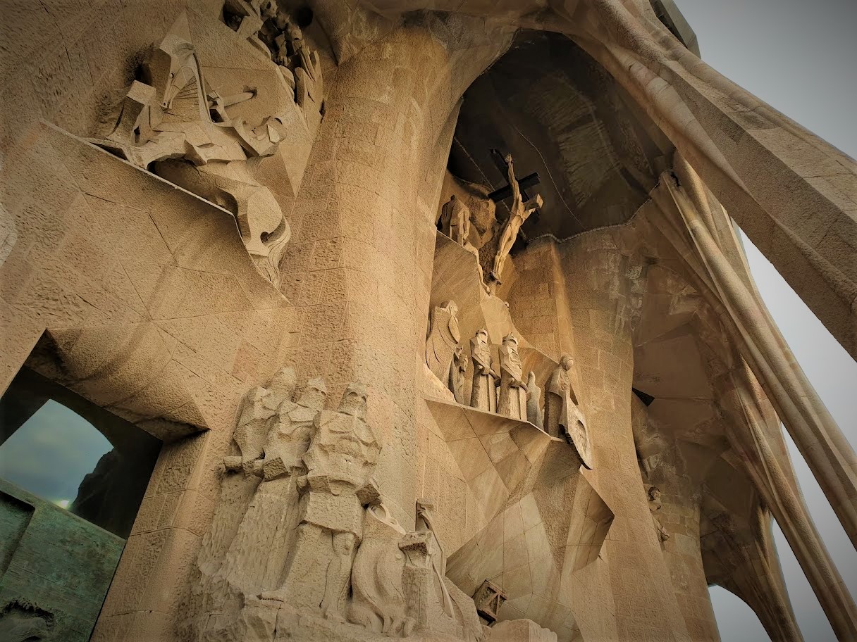 Passion entrance on La Sagrada Familia, Barcelona. Stone sculptures representing Eastern and Jesus Crucifixion by Subirachs